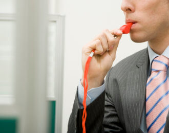 Man with Red Whistle in Office