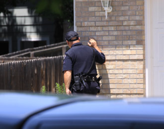 policeman searching for suspect