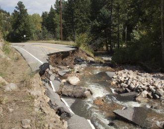 Highway destroyed Left Hand Creek flood damage Boulder Colorado