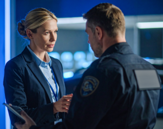 Female Police Chief Speaking with Lieutenant