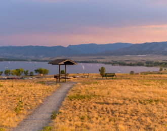 Sunset Summer Park – A Summer sunset view of a quiet picnic area at top of Chatfield Dam, Chatfield State Park, Denver-Littleton, Colorado, USA.